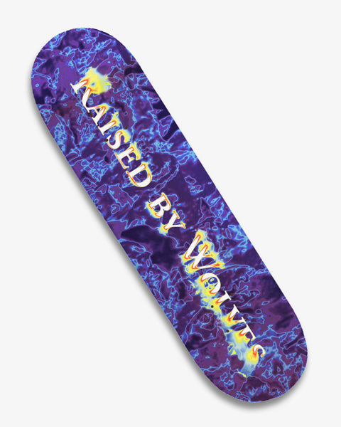 The bottom of a skateboard deck, with shades of blue in a thermal pattern. Raised By Wolves is printed in white with a red and green thermal pattern around it.